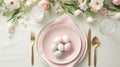 A table setting for Easter with pastel-colored eggs on a pink plate, flanked by golden cutlery and fresh spring flowers