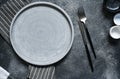Table setting. Empty plate, knife, fork and napkin. Top view and flat lay with copy space Royalty Free Stock Photo