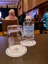 Kuala Lumpur, Malaysia - July 23, 2020: table setting with glass and a small bottles of drinking water during seminar