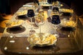 Table setting of luxurious glasses and plates