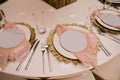 Table setting at a luxury wedding and Beautiful flowers on the table Royalty Free Stock Photo