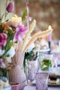 Table setting at a luxury wedding or party, babyshower, birthday and Beautiful flowers, cake,candles decortation on the Royalty Free Stock Photo