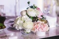 Table setting at a luxury wedding reception. Beautiful flowers on the table Royalty Free Stock Photo