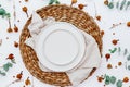 Table setting mock-up scene. Porcelain plate and cutlery.