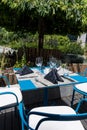 Table setting outdoor terrace. Nobody in the picture just table setup with cutlery and glasses