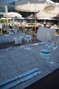 Table setting outdoor terrace. Nobody in the picture just table setup with cutlery and glasses Royalty Free Stock Photo