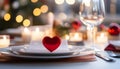 Table setting with red heart for festive dinner Royalty Free Stock Photo