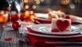 Table setting with red heart for festive dinner Royalty Free Stock Photo