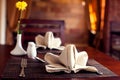 Table setting, restaurant interior. Fork, knife and glasses on the table. Food concept Royalty Free Stock Photo