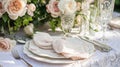 Table setting with rose flowers and candles for an event party or wedding reception in summer garden. Royalty Free Stock Photo