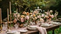 Table setting with rose flowers and candles for an event party or wedding reception in summer garden. Royalty Free Stock Photo