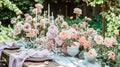 Table setting with rose flowers and candles for an event party or wedding reception in summer garden. Royalty Free Stock Photo