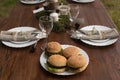 Table setting with served hamburgers Royalty Free Stock Photo