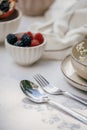 Table setting with silverware and dishware for lunch outdoors Royalty Free Stock Photo