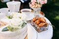 Table setting, tea party, closeup view on sweets Royalty Free Stock Photo