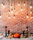 Table setting for Thanksgiving day. Autumn table with pumpkins and candles. fall home decoration for festive dinner Royalty Free Stock Photo