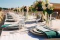 Table setting at a wedding banquet. Decoration flowers Royalty Free Stock Photo