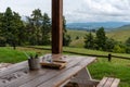 Table settings at a restaurant with a rural background