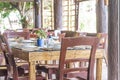 Table setup in outdoor cafe, small restaurant in a hotel, summer Royalty Free Stock Photo