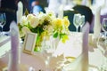 table with sign for number or names of guests in banquet hall of restaurant. Royalty Free Stock Photo