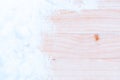 Table snow. Winter wooden texture background. Christmas board with old rustic wood wall, white frozen ice. Merry Royalty Free Stock Photo