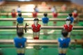 Table soccer game with closeup red footballer Royalty Free Stock Photo