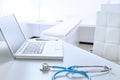 On the table is a stethoscope, laptop and mobile phone Royalty Free Stock Photo