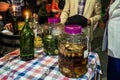 A table with strong drinks to greet guests at the Georgian restaurant in Tbilisi city in Georgia