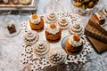 Table with sweets and goodies for the wedding party reception, decorated dessert table. Delicious sweets on candy buffet. Dessert Royalty Free Stock Photo