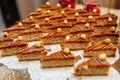 Table with sweets and goodies for the wedding party reception, decorated dessert table. Delicious sweets on candy buffet Royalty Free Stock Photo