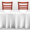 Table with a tablecloth and chair Royalty Free Stock Photo