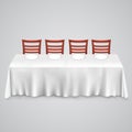 Table with a tablecloth and chair Royalty Free Stock Photo