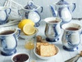 Table tea set for afternoon tea biscuits lemon jam. Royalty Free Stock Photo