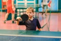 Table tennis, child playing table tennis, tennis ball and racket Royalty Free Stock Photo