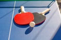 Table tennis ping pong two paddles and white ball Royalty Free Stock Photo