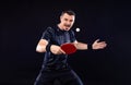 Table tennis player on the black background. Ping pong banner. Download a photo of a table tennis player for a tenis Royalty Free Stock Photo