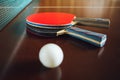 Table tennis rackets and ball, close-up view Royalty Free Stock Photo