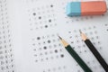 On table is test with options for answer pencils and wash Royalty Free Stock Photo
