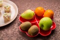 on the table there is salad in tartlets, fruit snacks Royalty Free Stock Photo