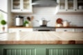 Table top with blurred kitchen furniture as background Royalty Free Stock Photo