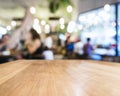 Table top with Blurred People Cafe Shop interior background