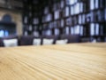 Table top with Blurred Sofa pillows Book shelf Background Royalty Free Stock Photo