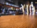 Table top counter Bar Beer tap Blur shelf on background Royalty Free Stock Photo