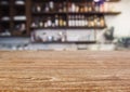 Table top Counter with Blurred Bar Shelf bottles Restaurant cafe