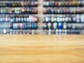 Table top Counter with Blurred Wine Liquor bottles Display Royalty Free Stock Photo