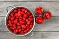 Table top view - homemade strawberry compote preparation. Metal Royalty Free Stock Photo