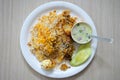Table Top view of Indian Chicken Biryani Plate served with Egg and Potato in White Plate Royalty Free Stock Photo