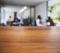 Table top wooden counter Blur Cafe restaurant interior with People sitting on background Royalty Free Stock Photo