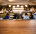 Table top wooden counter Blur Cafe restaurant interior with People sitting Blur background Royalty Free Stock Photo