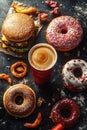 A table topped with donuts and a cup of coffee, perfect for a breakfast or snack scene Royalty Free Stock Photo